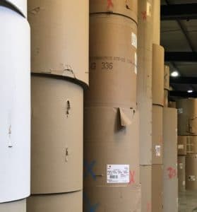 Paper reels in a warehouse for box making